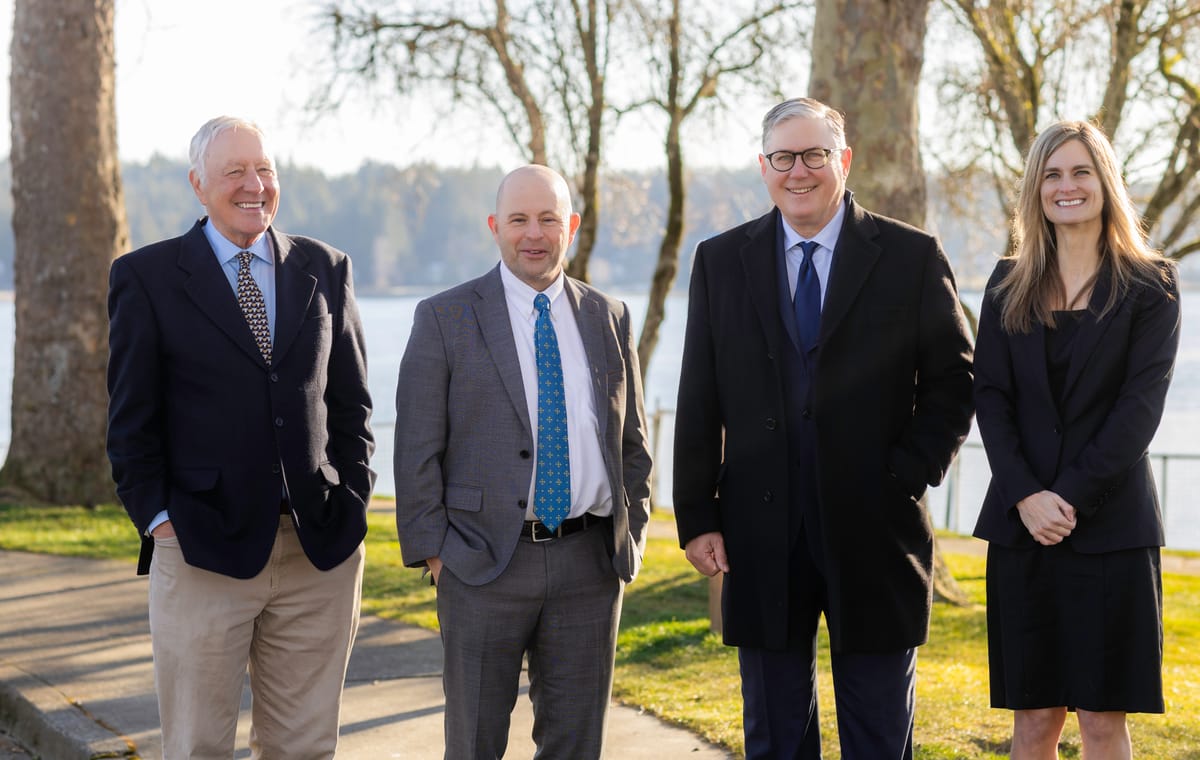 Bill H. Broughton, David P. Horton, David A. Weibel and Christy Palmer on the Kitsap waterfront