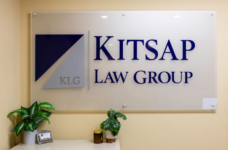 The Kitsap Law Group logo on the lobby wall of the Silverdale office