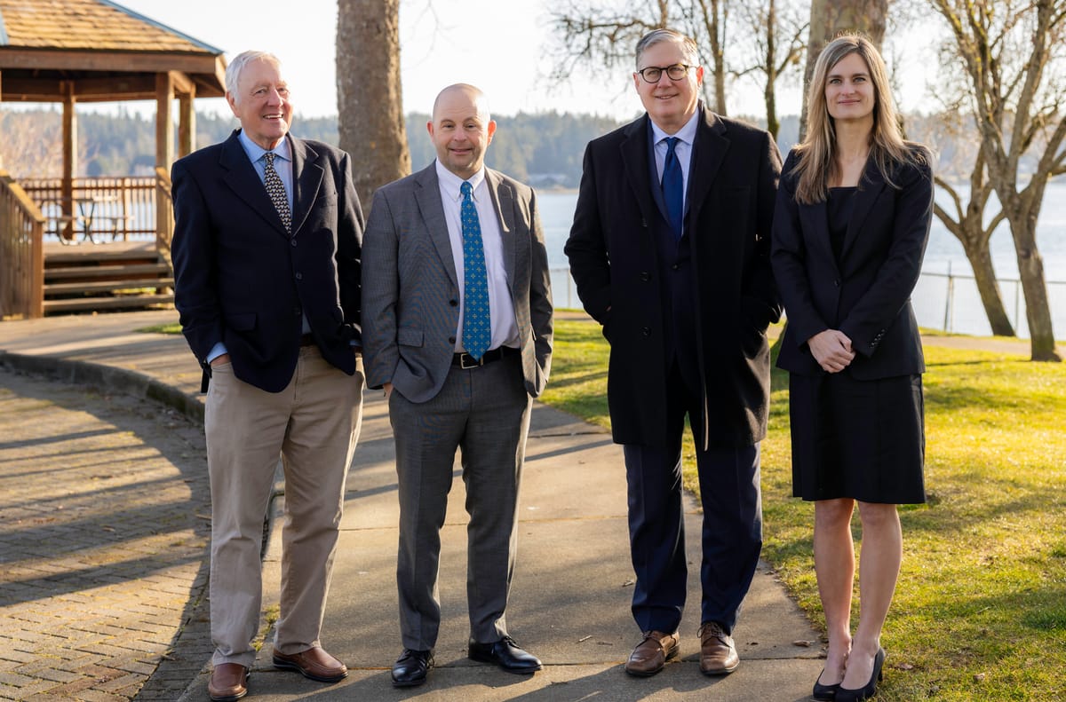 Kitsap Law Group partners on a waterfront path in Silverdale